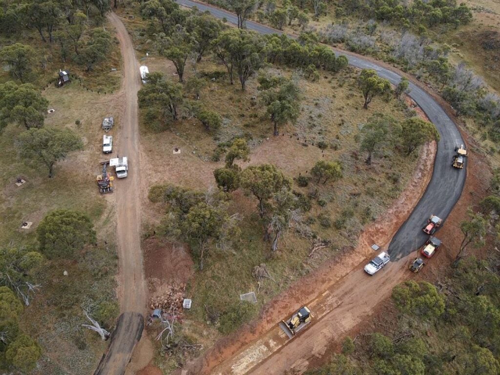 Aerial view of Blue Waterholes Fire Trail upgrade through rugged terrain by South East Civil & Crane.