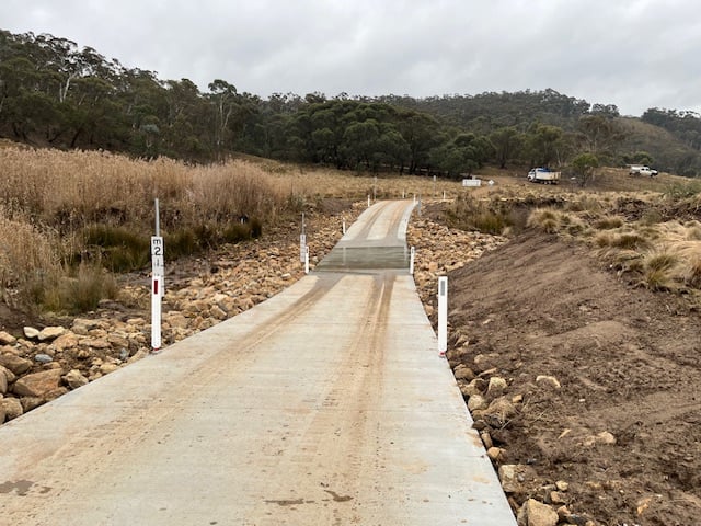 Concrete bed level crossing built across creek at Springs Crossing by South East Civil & Crane.